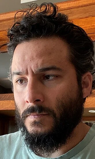 Ennis Esmer portrait